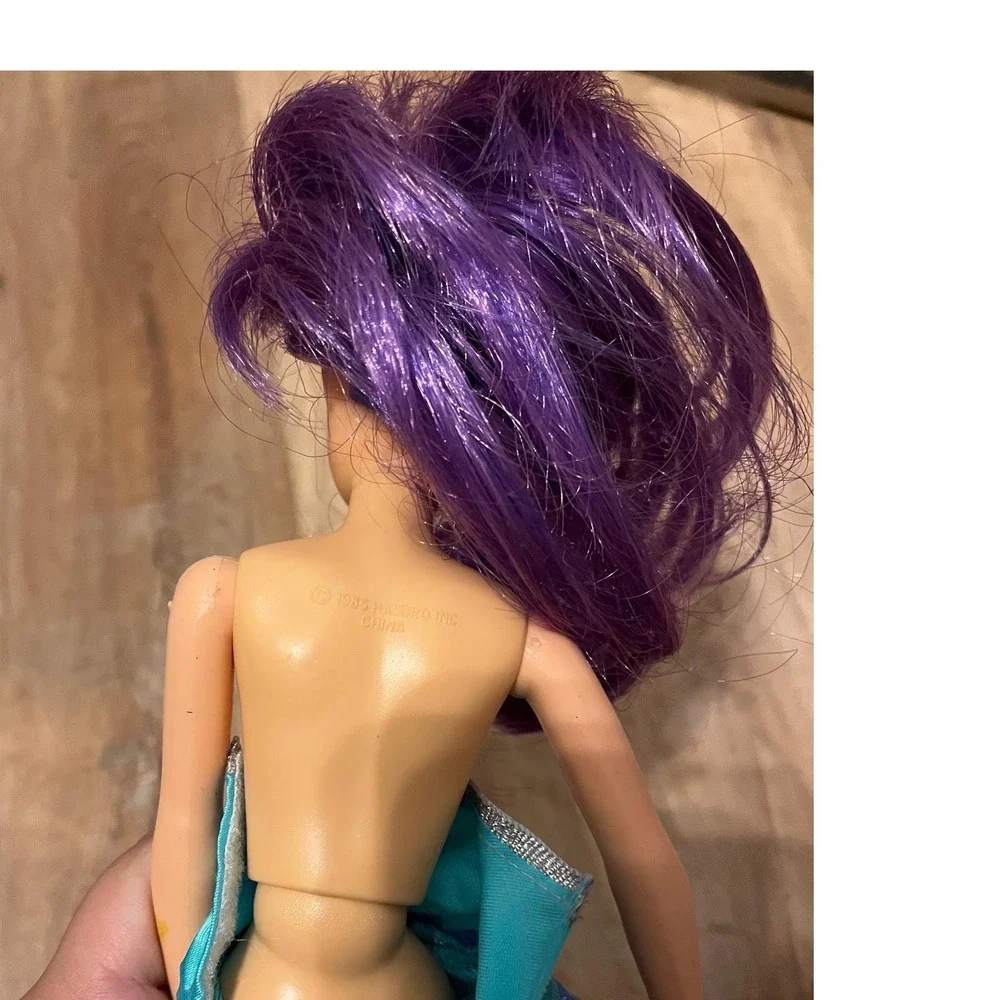 Vintage 1985 Hasbro Jem and the Holograms Doll Purple Hair Star Dress 80s Toy‎